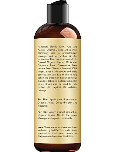 Bottle of organic jojoba oil with usage instructions